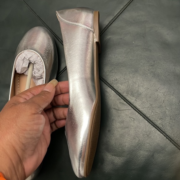 Silver flats never worn. Ordered & arrived from retailer w/o a box as pictured. - Picture 7 of 11